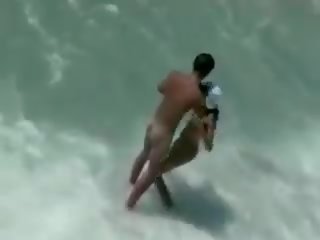 Tempting teenagers fuck on the shore