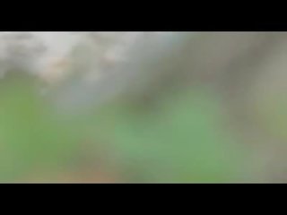 Terrific ýaşlar tutulan blowing and sürmek on the pläž by a peeper video