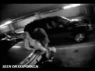 Couple caught on parkinglot cam